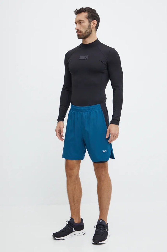 Къс панталон за бягане Reebok 100206010 тюркоазен AW24
