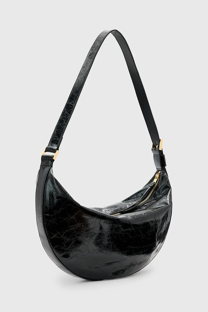 Kožená kabelka AllSaints HALF MOON W020XZ černá SS25