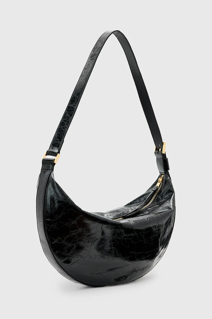Kožená kabelka AllSaints HALF MOON W020XZ černá SS25