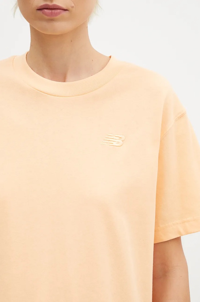 Bombažna kratka majica New Balance Athletics Jersey oranžna WT41501PAE