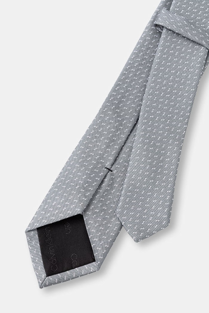 Calvin Klein kravata pánská s hedvábím CK2111E004 šedá SS26