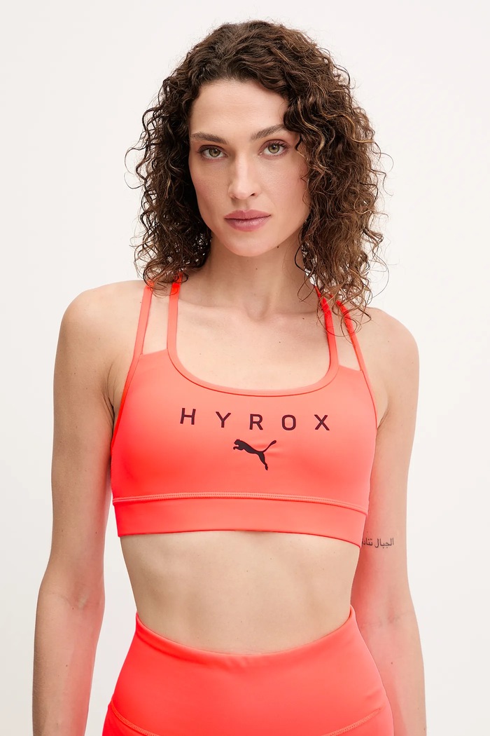 Sportovní podprsenka Puma PUMA x HYROX potisk oranžová 527161