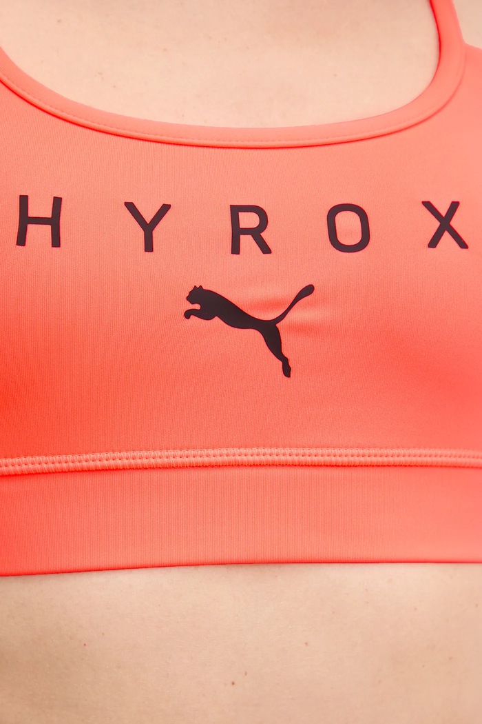 Sportovní podprsenka Puma PUMA x HYROX 527161 oranžová