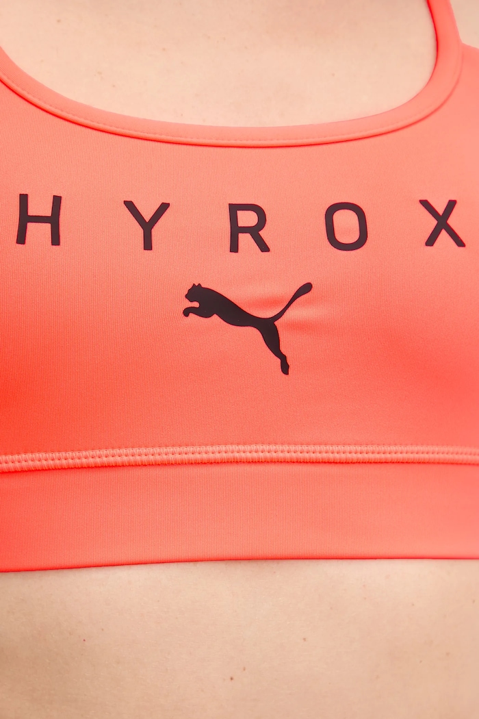 Sportovní podprsenka Puma PUMA x HYROX 527161 oranžová