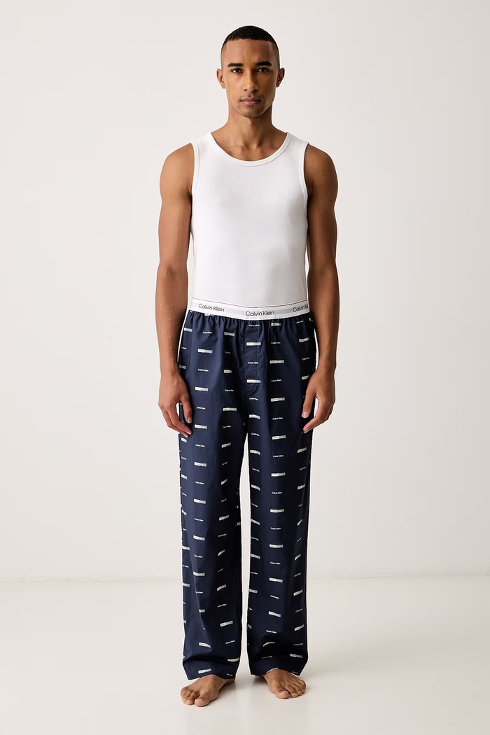 Calvin Klein Underwear Pyžamové kalhoty pánské bavlněné LV00NM2830 námořnická modř SS26