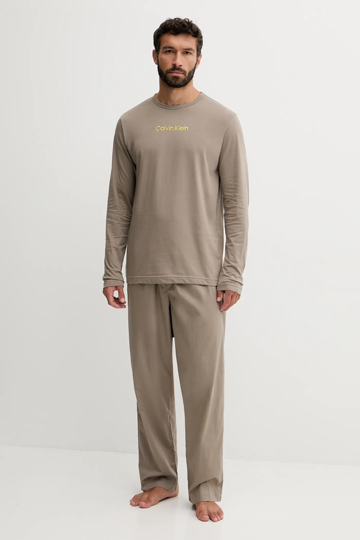 Calvin Klein Underwear pyžamové nohavice pánske bavlnené LV00NM2830 béžová SS26
