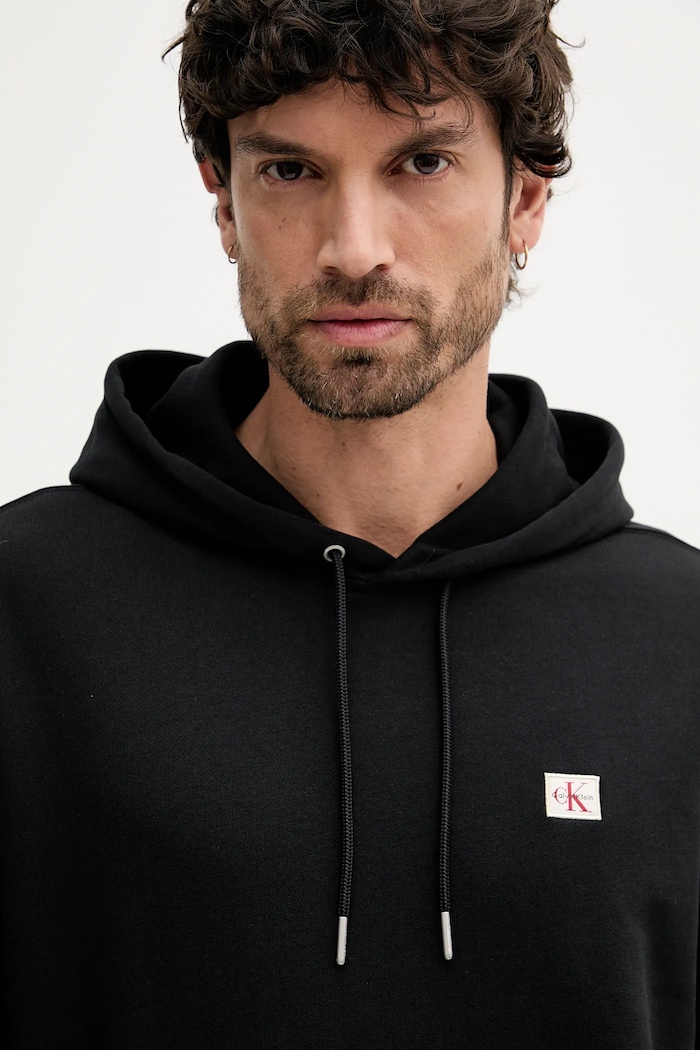 Oblačila Calvin Klein Jeans pulover s kapuco moški bombažen LV04RC274G črna