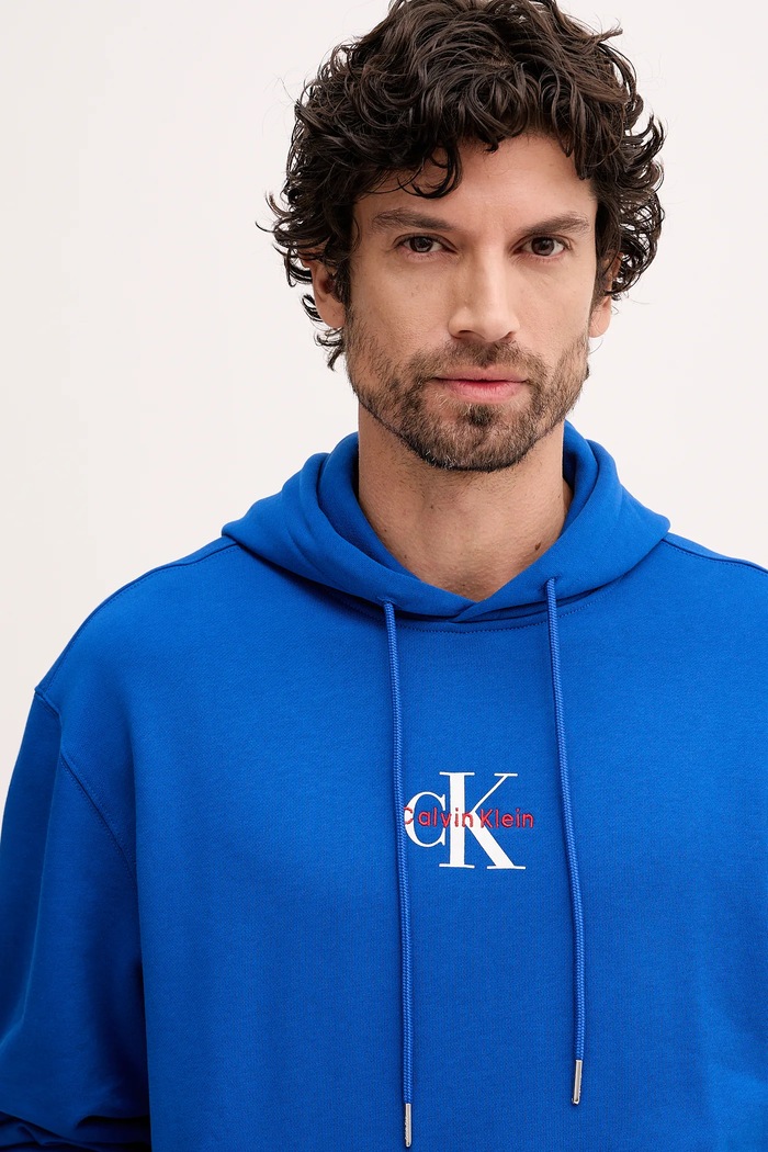 Calvin Klein Jeans mikina s kapucí pánská bavlněná modrá LV04RD243G
