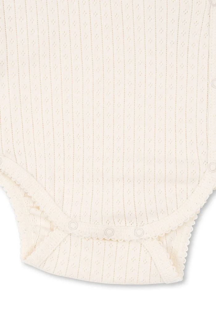 Bavlněné kojenecké body Konges Sløjd MINNIE NEWBORN BODY GOTS Konges Sløjd béžová KS103919.9BYA