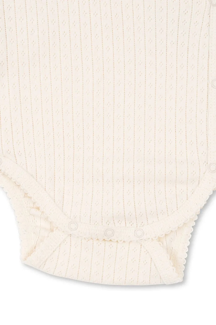 Bavlněné kojenecké body Konges Sløjd MINNIE NEWBORN BODY GOTS Konges Sløjd béžová KS103919.9BYA