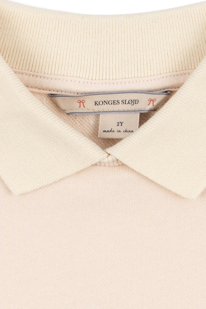 Konges Sløjd longsleeve bawełniany dziecięcy SPOTTY LS POLO GOTS beżowy KS105184.9BYA