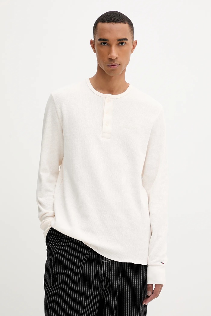 Bavlnené tričko s dlhým rukávom Tommy Jeans jednofarebný béžová DM0DM21812