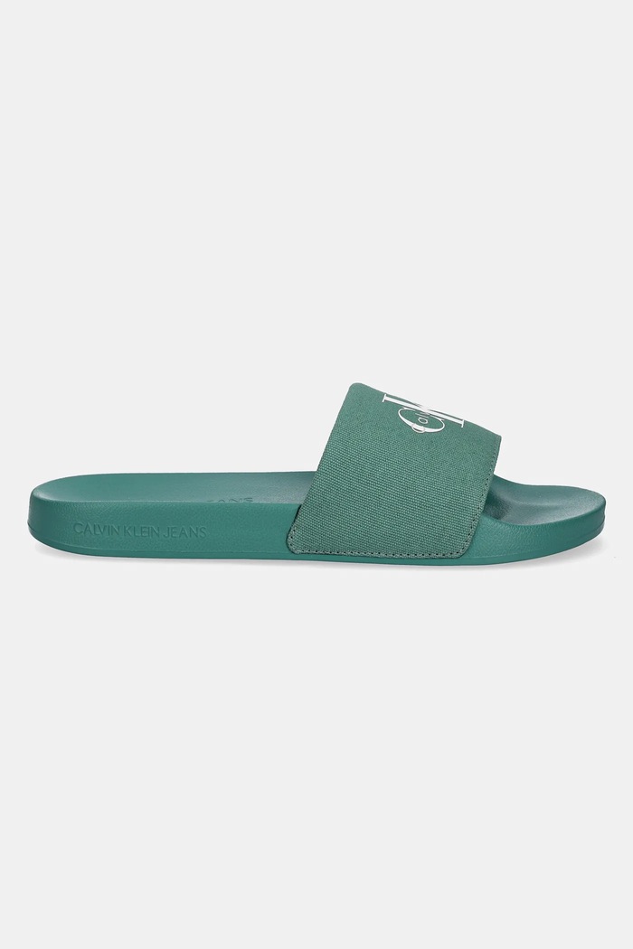 Pantofle Calvin Klein Jeans SLIDE MONOLOGO CV YM0YM01367 zelená AW25