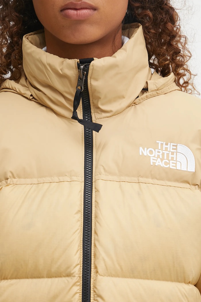 Péřová bunda The North Face 1996 Retro Nuptse béžová NF0A3XEOGM31