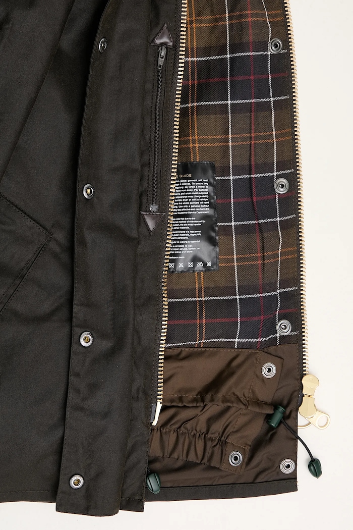 Bavlněná bunda Barbour Transport Wax Jacket LWX1410OL71