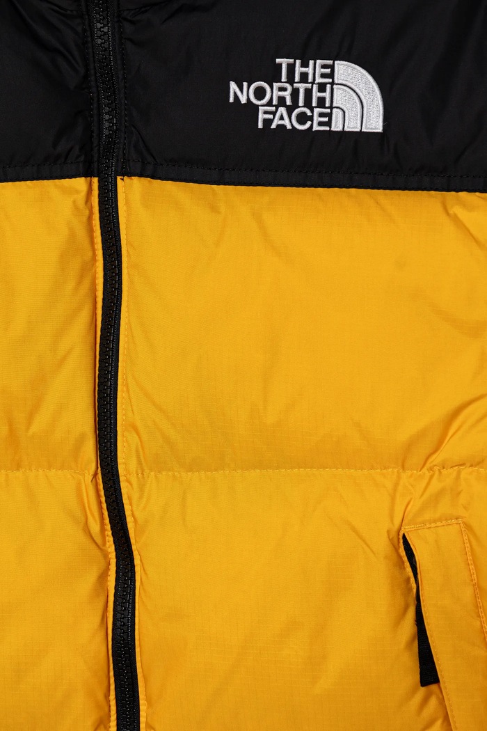 Chłopiec The North Face kurtka puchowa dziecięca TEEN 1996 RETRO NUPTSE JACKET NF0A8A4CGO71 żółty