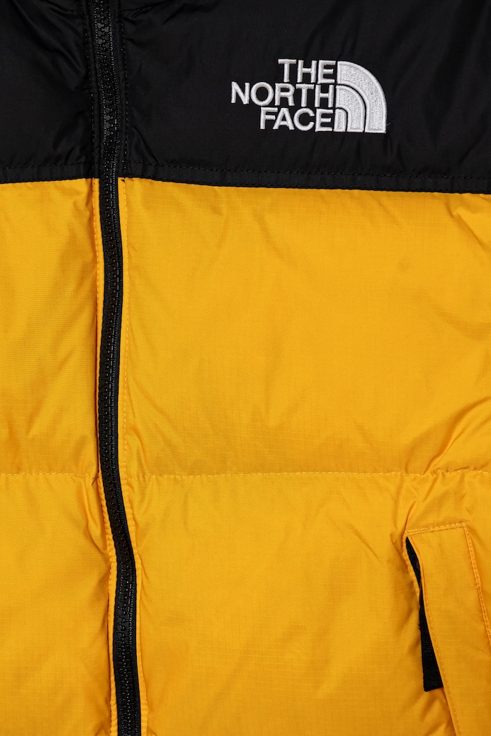 Chłopiec The North Face kurtka puchowa dziecięca TEEN 1996 RETRO NUPTSE JACKET NF0A8A4CGO71 żółty