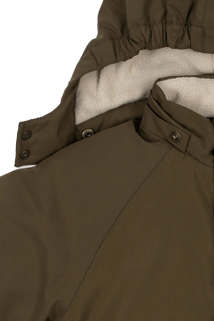 Detský overal Konges Sløjd AWARD SNOWSUIT SOLID GRS KS103444.9BYA zelená