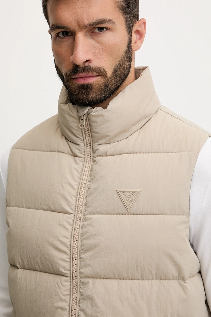 Αμάνικο μπουφάν Guess ROHAN μπεζ Z5YL08.WGTN0