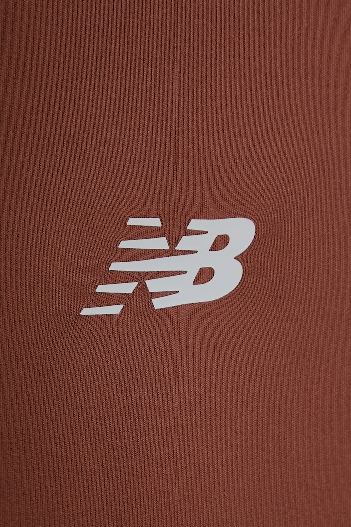 Tréninkové legíny New Balance hnědá WP51112ROK
