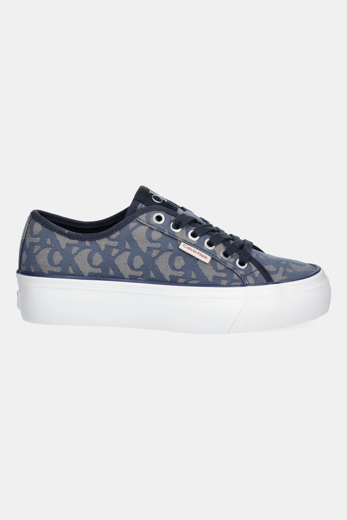 Tenisky Calvin Klein Jeans VULC FLATF JACQUARD AOP YW0YW01965 tmavomodrá AW25