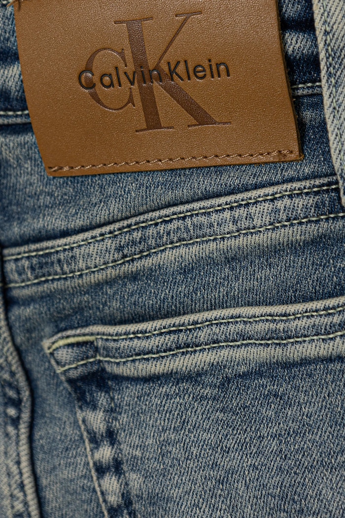 Detské rifle Calvin Klein Jeans SLIM modrá IB0IB02189.128.170.9BYA