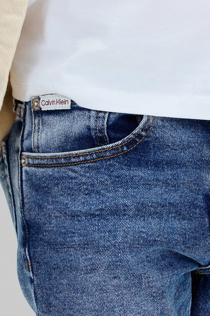 Detské rifle Calvin Klein Jeans DAD modrá IB0IB02547.9BYA