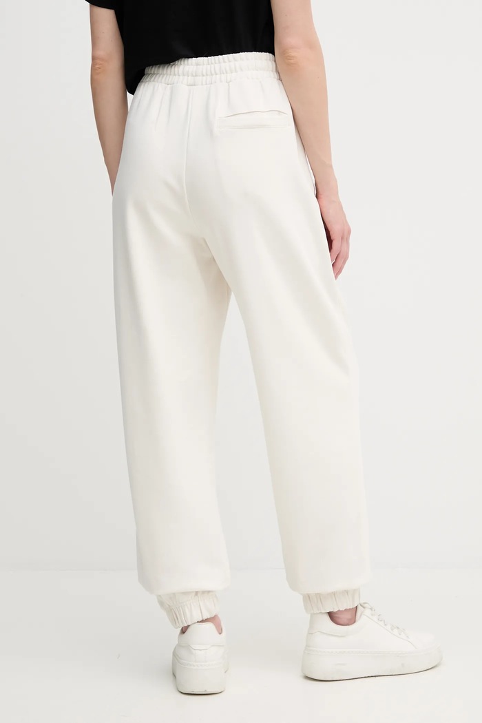 Oblečení Bavlněné tepláky Calvin Klein LV044C904G béžová