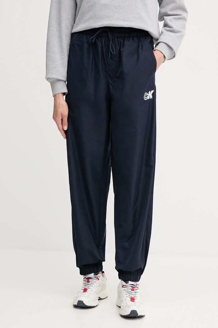 Spodnji del trenirke Calvin Klein Jeans Tkanina mornarsko modra LV047C627G