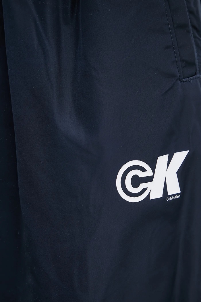 Spodnji del trenirke Calvin Klein Jeans mornarsko modra LV047C627G
