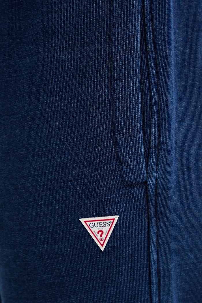 Bavlnené tepláky Guess Jeans tmavomodrá W5YB65.KCXQ1