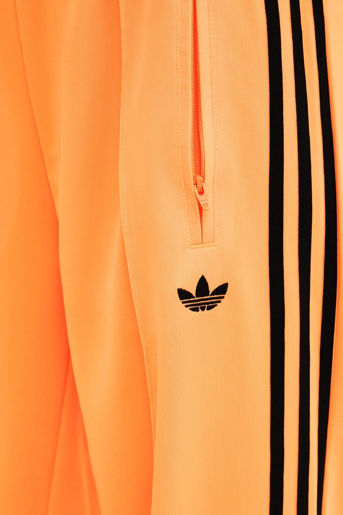 adidas Originals spodnie dresowe Firebird pomarańczowy JY2694