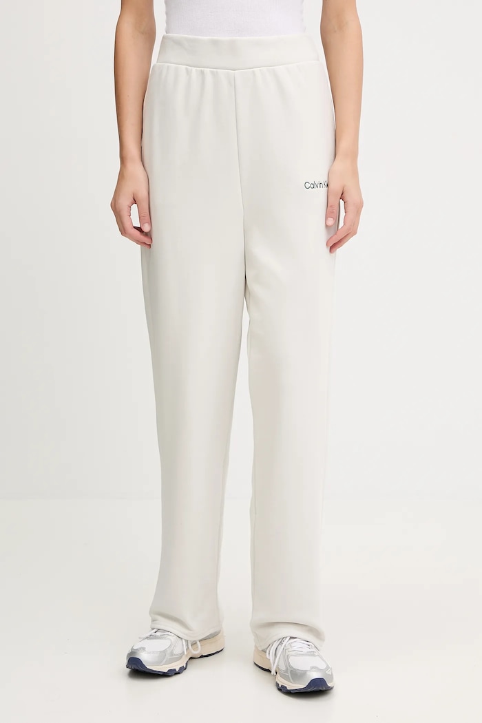 Calvin Klein Performance spodnie dresowe dzianina beżowy LVGWF5P627