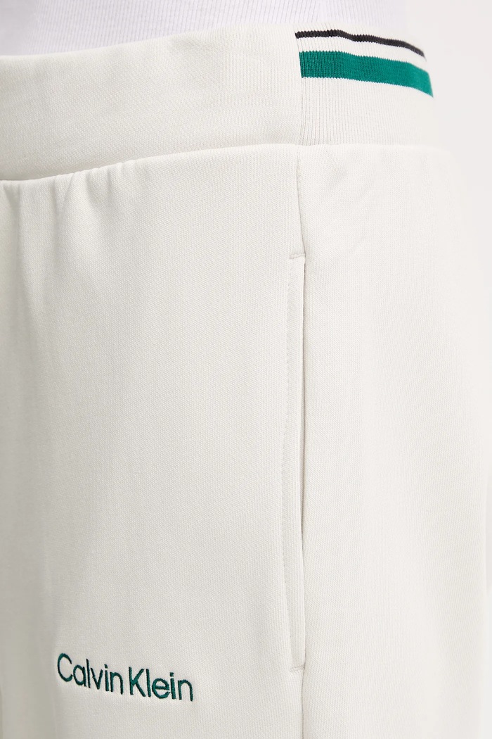 Calvin Klein Performance spodnie dresowe beżowy LVGWF5P627
