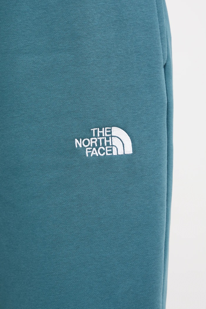 The North Face spodnie dresowe Essential Relaxed turkusowy NF0A8C1GBQ51
