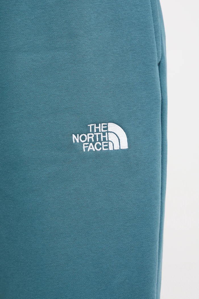 The North Face spodnie dresowe Essential Relaxed turkusowy NF0A8C1GBQ51
