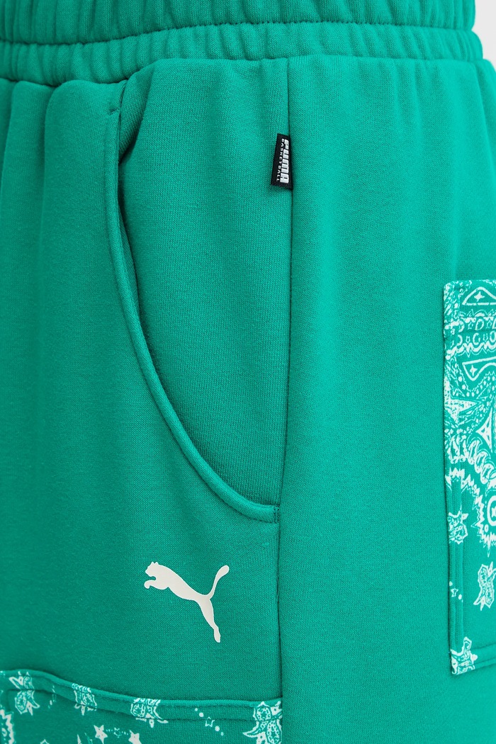 Bavlnené tepláky Puma zelená 632845