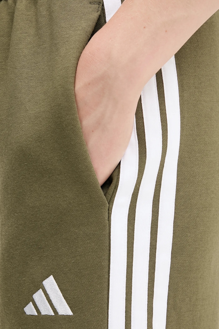 Tepláky adidas zelená JX7708