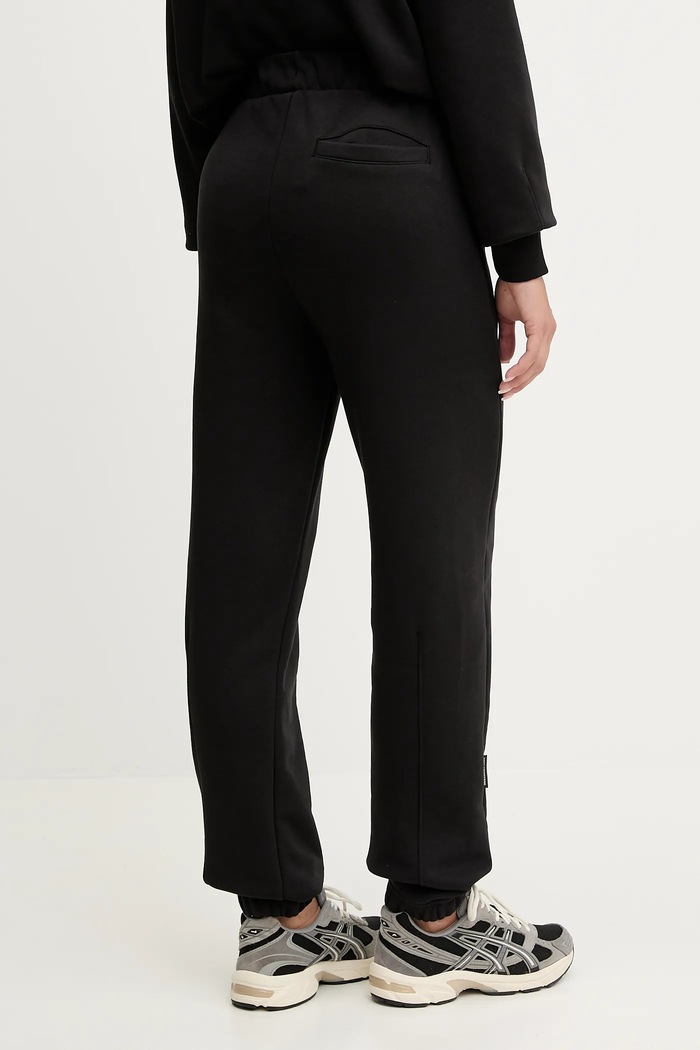 Îmbrăcăminte On pantaloni de trening Club 1WE10050553 negru