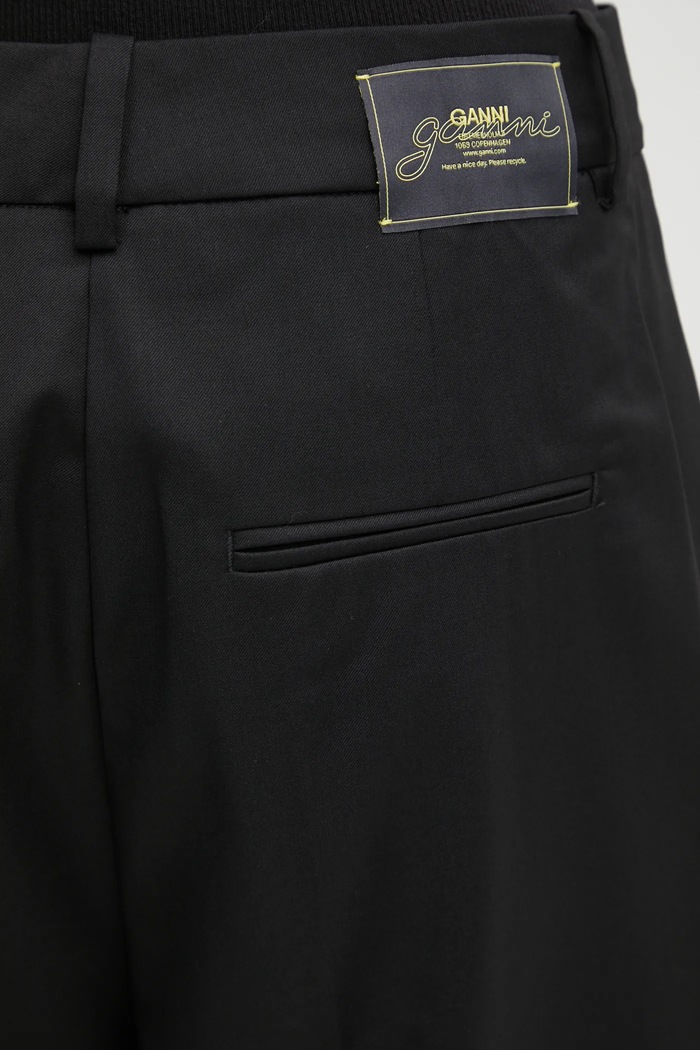 Kalhoty s příměsí vlny GANNI Calendered Wool Mid Waist W0799 černá