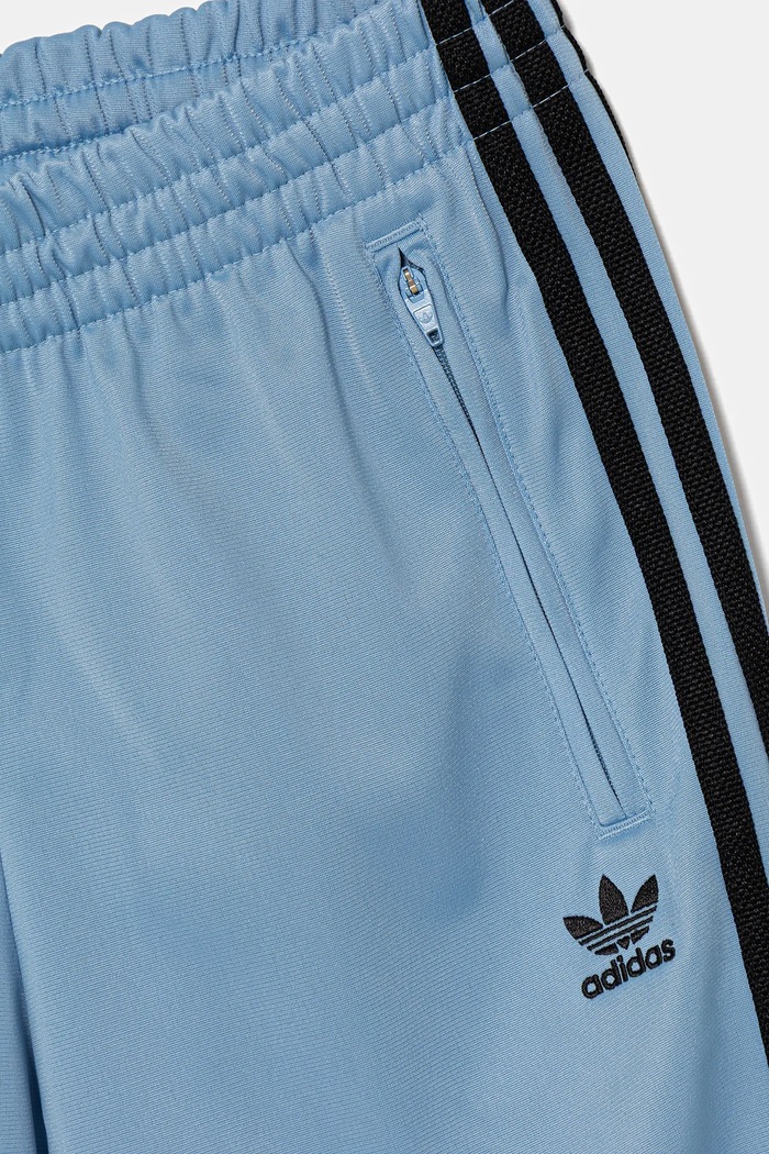 Otroški spodnji del trenirke adidas Originals modra JV8592