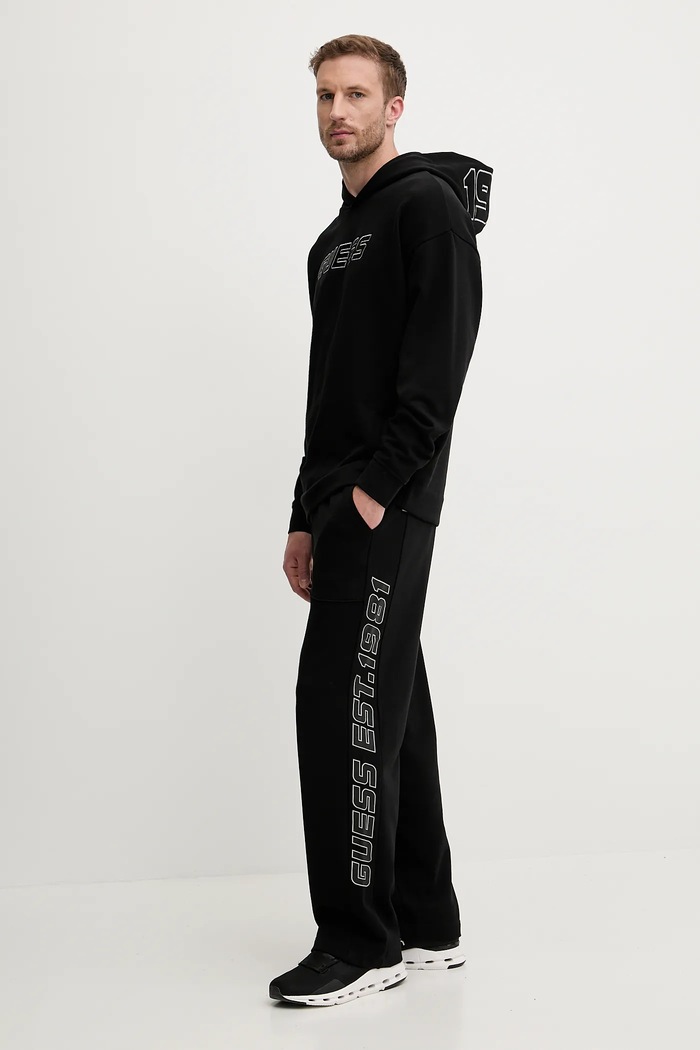 Guess spodnie dresowe bawełniane MENTORE Z5YB00.KCE91 czarny AW25