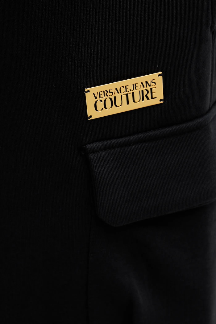 Bavlněné tepláky Versace Jeans Couture černá 79GAAT08.CF01T