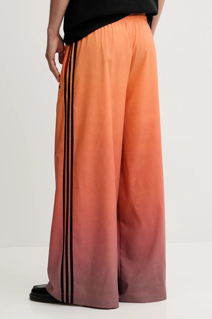 Odzież adidas Originals spodnie dresowe Adilenium JW7260 pomarańczowy