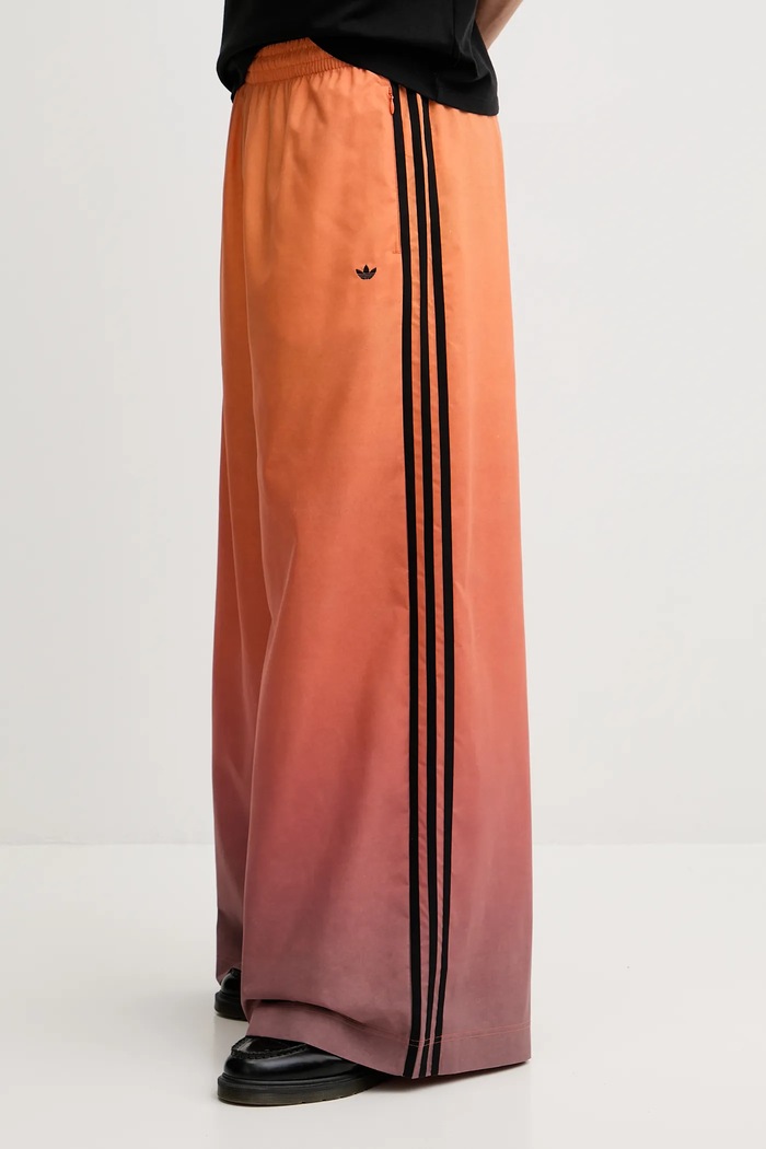 adidas Originals spodnie dresowe Adilenium pomarańczowy JW7260