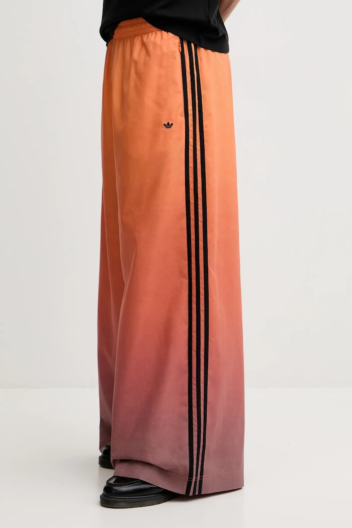 adidas Originals spodnie dresowe Adilenium pomarańczowy JW7260