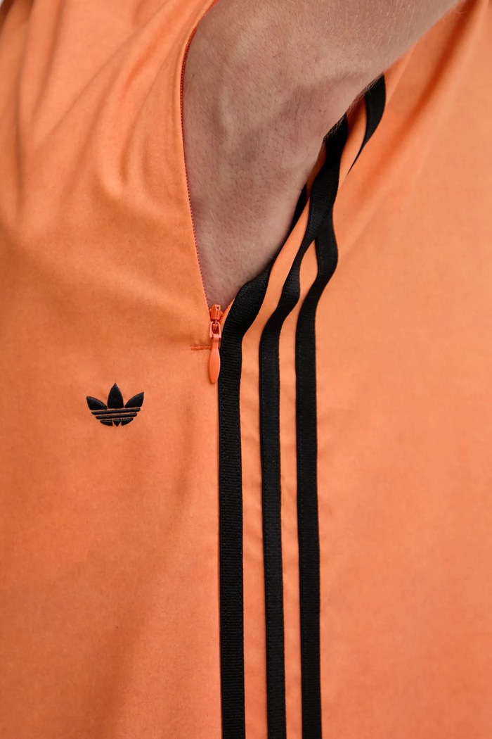 adidas Originals spodnie dresowe Adilenium JW7260 pomarańczowy