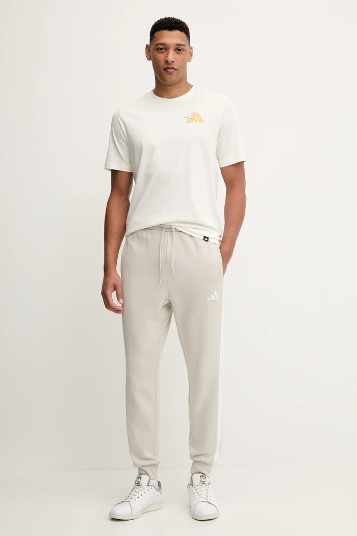 Tepláky adidas Essentials JE6317 béžová SS26