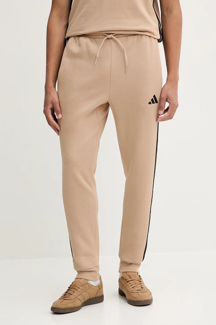 adidas melegítőnadrág Essentials aplikációval bézs JX0712