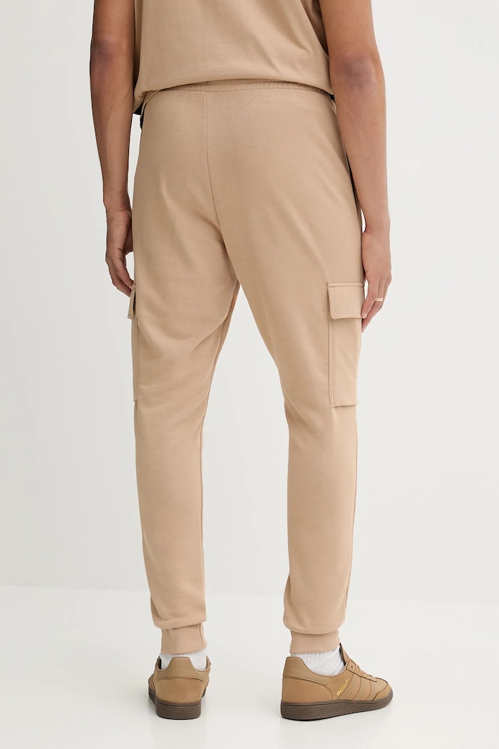 Îmbrăcăminte adidas pantaloni de trening Feelcozy JX3332 bej